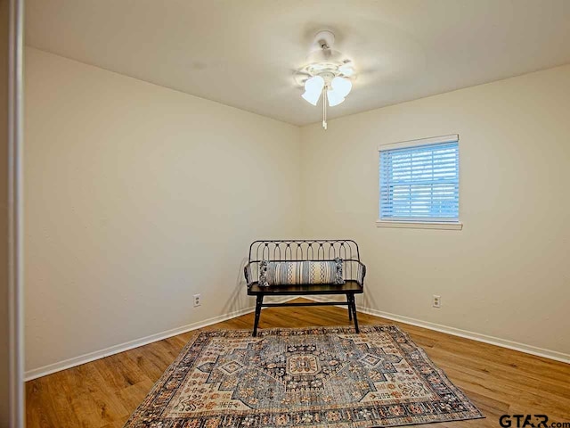704 Wellington St, Tyler, TX 75703 - living area featuring a ceiling fan and wood finished floors