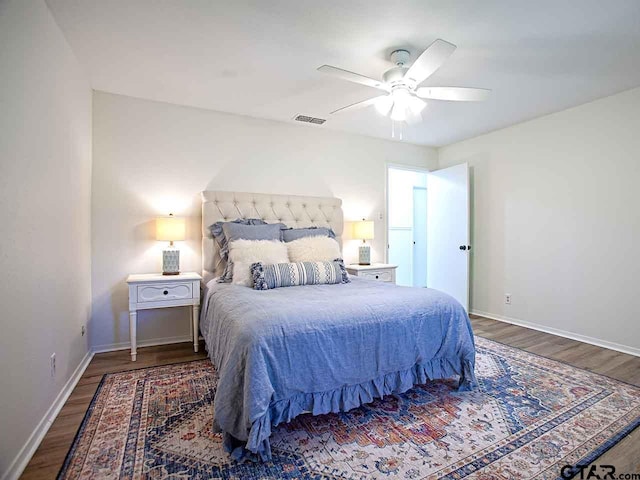 704 Wellington St, Tyler, TX 75703 - bedroom with wood finished floors and ceiling fan