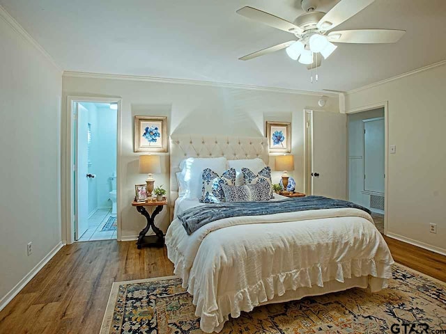 bedroom featuring connected bathroom, ceiling fan, crown molding, and hardwood / wood-style flooring