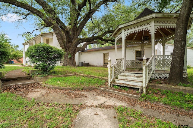 exterior space with a lawn and a porch