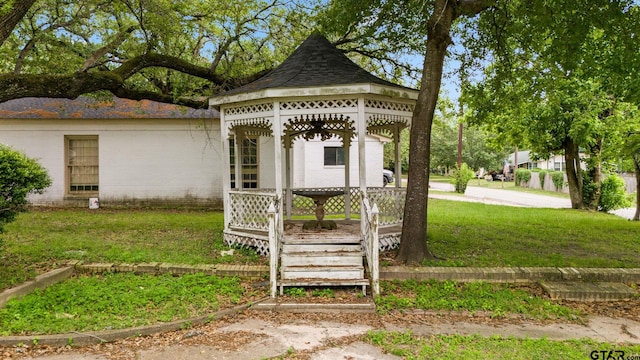 exterior space with a yard