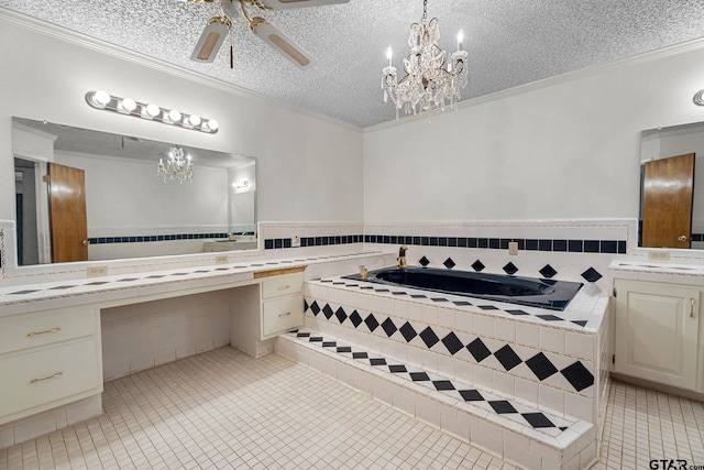 bathroom with tile patterned flooring, a textured ceiling, tiled bath, ornamental molding, and vanity