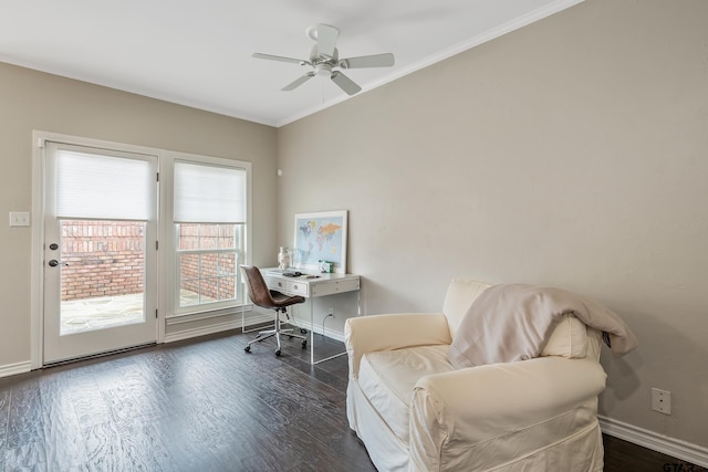 office area featuring dark hardwood / wood-style flooring, ornamental molding, and ceiling fan