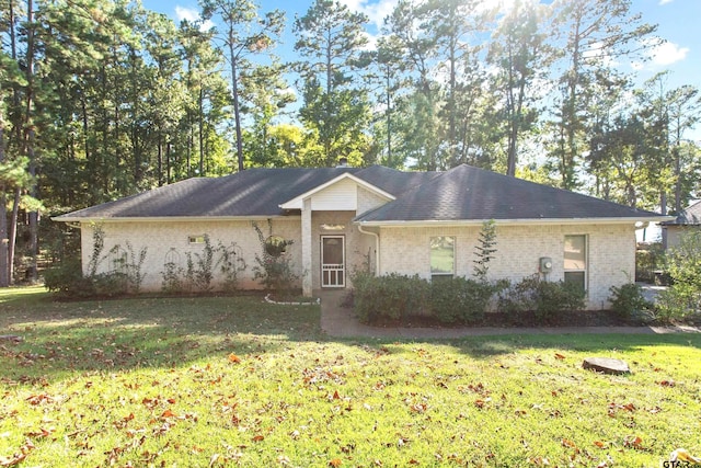 single story home with a front yard