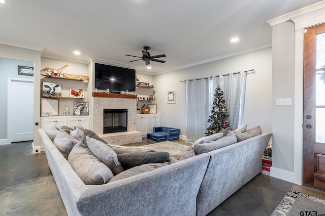 living room featuring a fireplace, ceiling fan, and crown molding