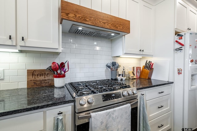 kitchen featuring white cabinetry, white fridge with ice dispenser, stainless steel range with gas stovetop, and range hood