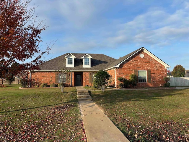 view of front facade with a front yard