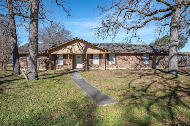 ranch-style home with a front yard