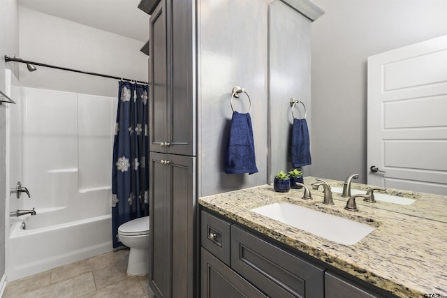 full bathroom featuring vanity, toilet, shower / tub combo with curtain, and tile patterned flooring