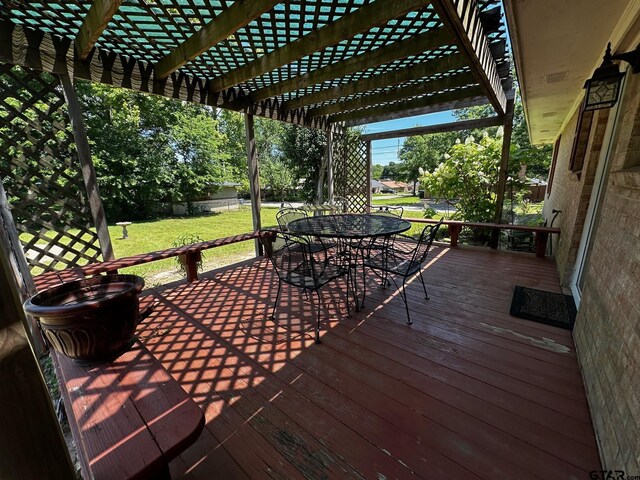 811 Windmill Ln, Athens, TX 75751 - wooden deck with a pergola, outdoor dining area, and a yard