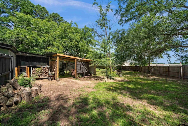 110 Utah St, Van, TX 75790 - fenced backyard with an outdoor structure