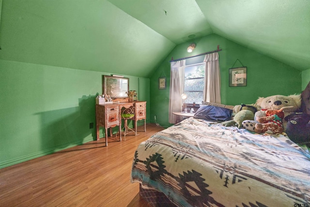 110 Utah St, Van, TX 75790 - bedroom with wood finished floors and lofted ceiling