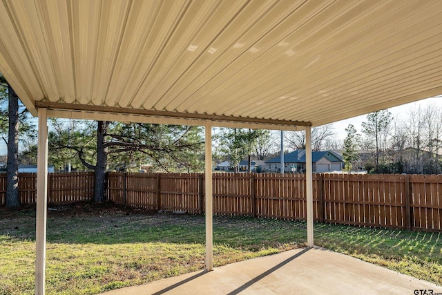 view of yard with a fenced backyard and a patio