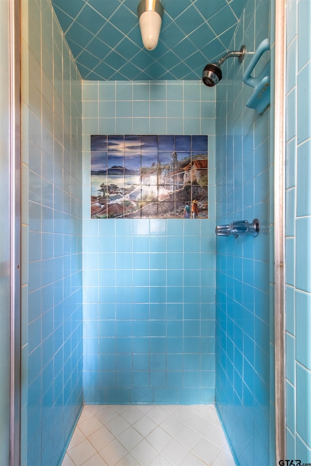 full bath featuring tiled shower