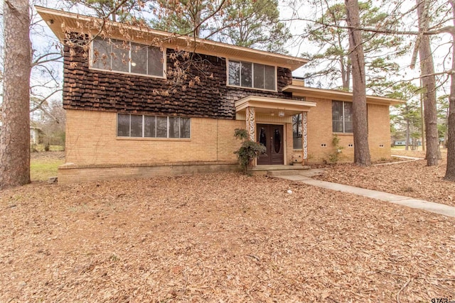 view of front of property featuring brick siding