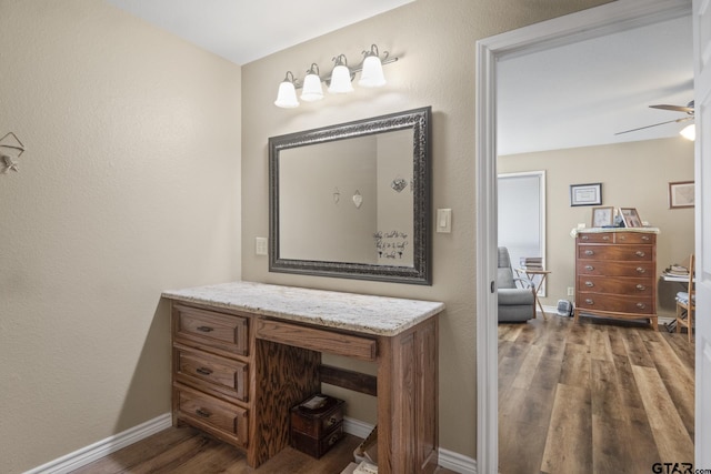 bathroom with ceiling fan, wood-type flooring, and vanity
