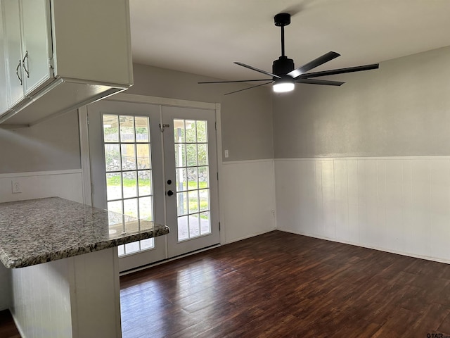 doorway to outside featuring ceiling fan, dark wood-type flooring, and french doors