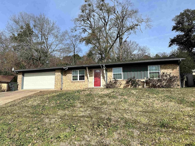 single story home featuring a garage and a front yard