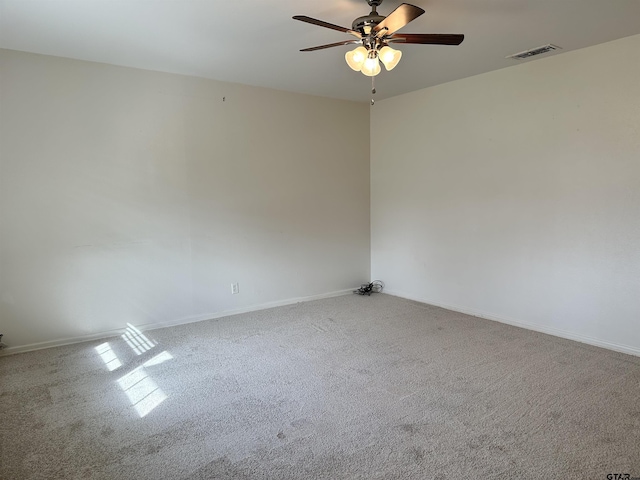 empty room with light carpet and ceiling fan