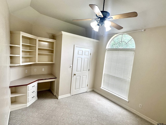807 Brownwood Cir, Lindale, TX 75771 - unfurnished office featuring built in desk, ceiling fan, light colored carpet, baseboards, and lofted ceiling