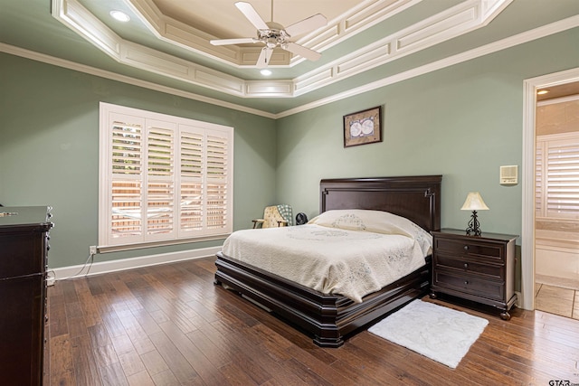 6530 Ashmore Ln, Tyler, TX 75703 - bedroom featuring ornamental molding, a raised ceiling, hardwood / wood-style floors, and a ceiling fan