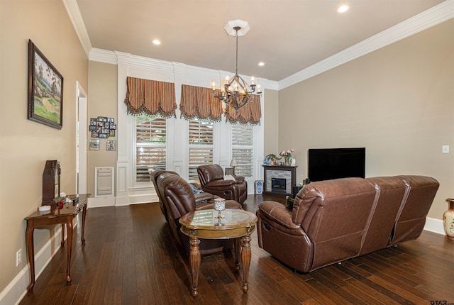 6530 Ashmore Ln, Tyler, TX 75703 - living room featuring a chandelier, ornamental molding, dark wood-style flooring, and recessed lighting