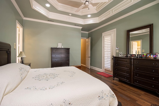 6530 Ashmore Ln, Tyler, TX 75703 - bedroom with dark wood-type flooring, ornamental molding, a raised ceiling, ceiling fan, and recessed lighting