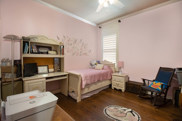 6530 Ashmore Ln, Tyler, TX 75703 - bedroom with ornamental molding, dark wood-style floors, a desk, and ceiling fan