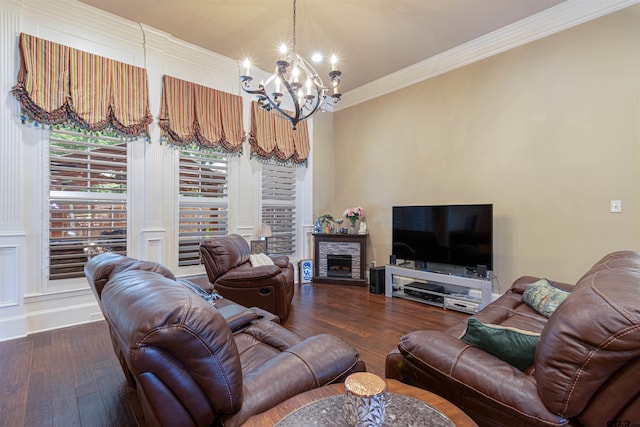 6530 Ashmore Ln, Tyler, TX 75703 - living area featuring a chandelier, wood-type flooring, ornamental molding, and a fireplace