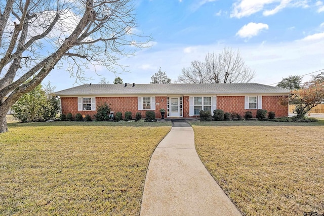 ranch-style home with a front yard