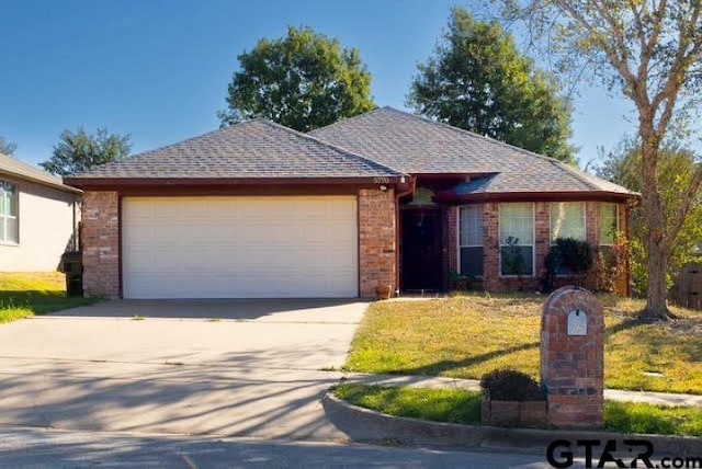 single story home with a garage