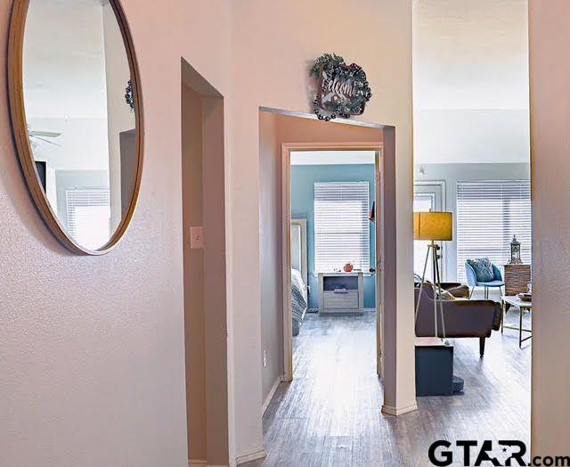 hallway featuring wood finished floors