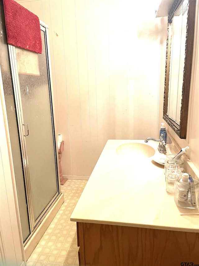 105 Walker Dr, Naples, TX 75568 - bathroom with a shower stall, tile patterned floors, and vanity