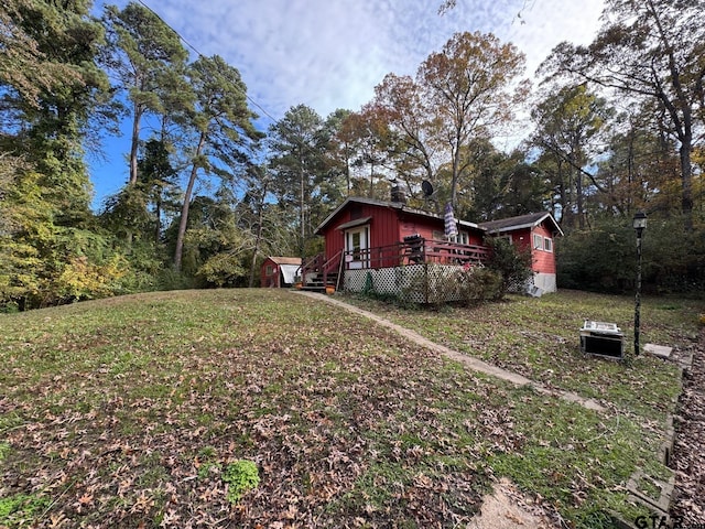 view of yard featuring a deck