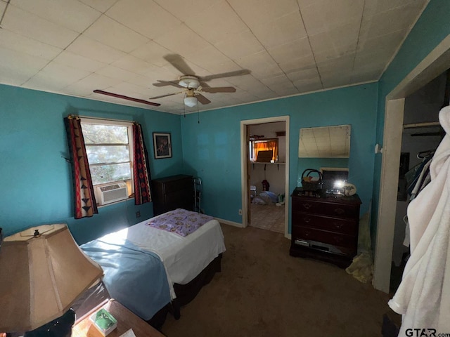 bedroom featuring cooling unit, ceiling fan, a closet, and carpet floors