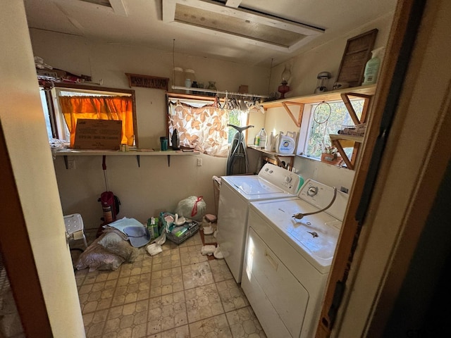 washroom featuring washing machine and dryer