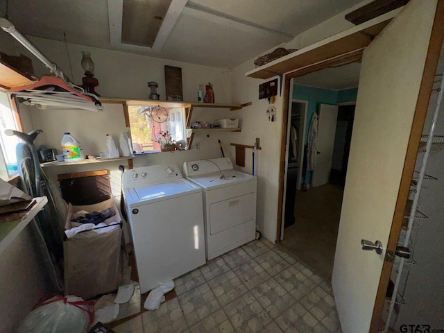 laundry room featuring washer and clothes dryer