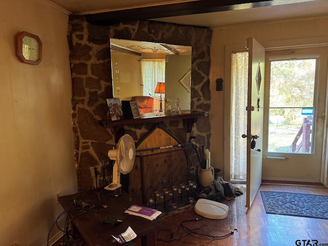 living room featuring crown molding