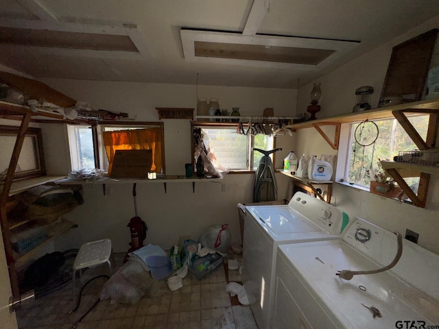 laundry room with washer and dryer