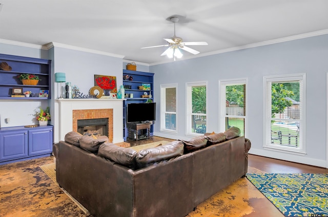 living room featuring a fireplace, ceiling fan, and crown molding