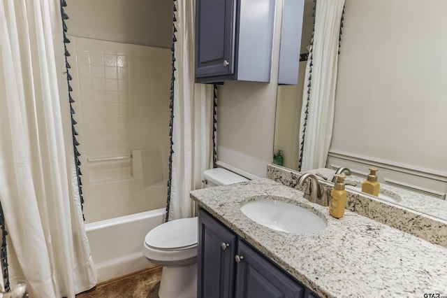 full bathroom featuring vanity, shower / bath combination with curtain, and toilet