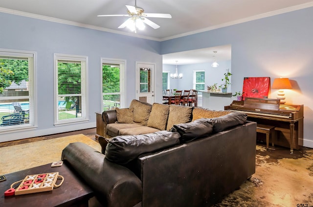 living room featuring ceiling fan with notable chandelier, ornamental molding, and concrete flooring