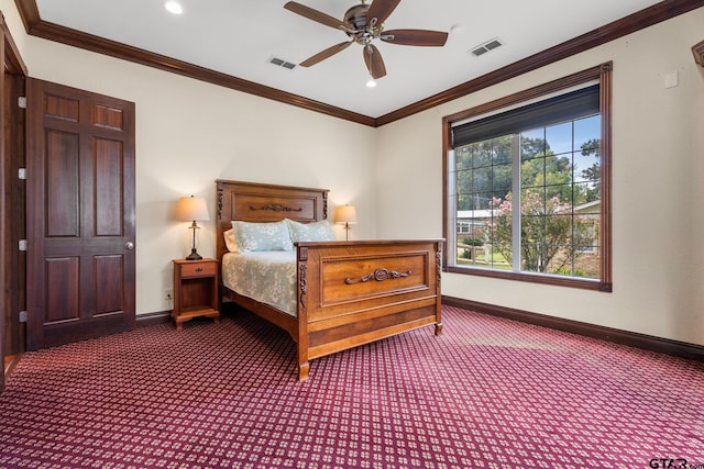 bedroom featuring ornamental molding, carpet flooring, and ceiling fan