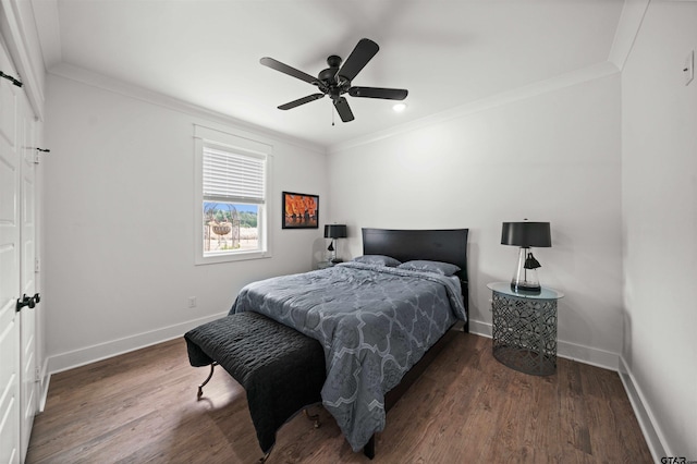 bedroom featuring crown molding, ceiling fan, and dark hardwood / wood-style floors