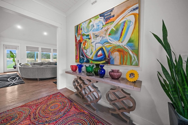 hallway with hardwood / wood-style floors and wood ceiling