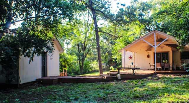 view of yard with a deck