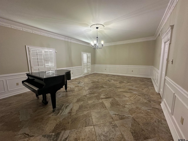 unfurnished dining area with a chandelier and crown molding