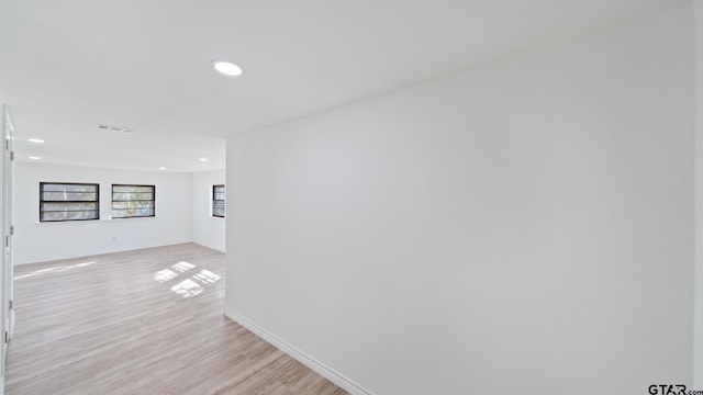 hallway featuring light wood-type flooring