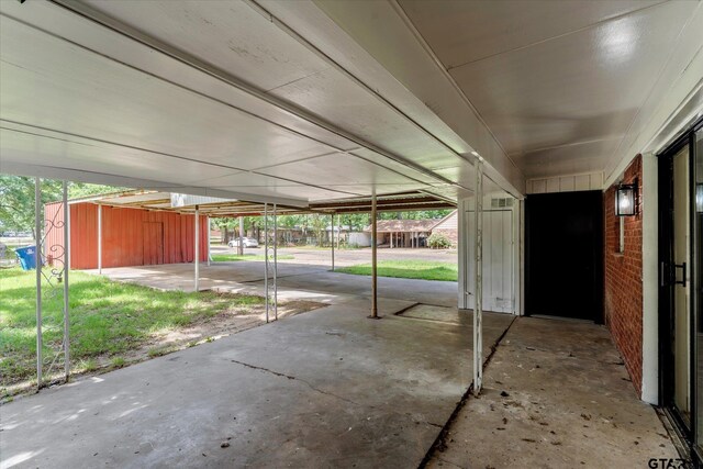2002 Friendly Ave, Mount Pleasant, TX 75455 - view of patio featuring a carport