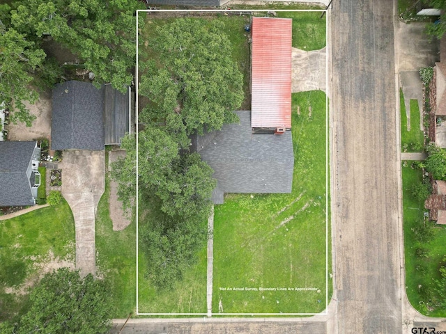 2002 Friendly Ave, Mount Pleasant, TX 75455 - aerial overview of property's location with property boundaries highlighted